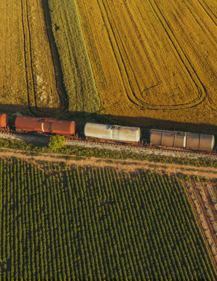 Tank railcars traveling near fields